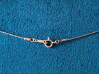 Fermoir à ressort gold filled rose 14K, détail collier Berkana Bijoux